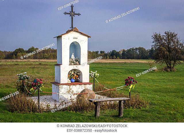 White wayside shrine near Brochow village, Sochaczew County in Masovian Voivodeship of Poland