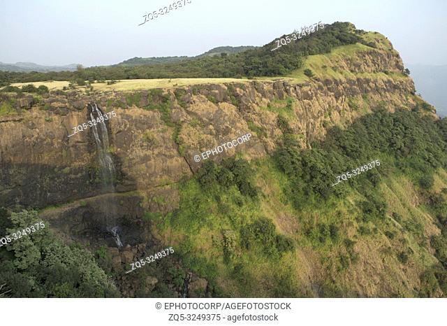 Landscape view of a waterfall and mountain near Made Ghats, Pune, Maharashtra