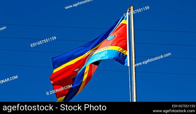 blur in swaziland waving flag and sky  like abstracr concept