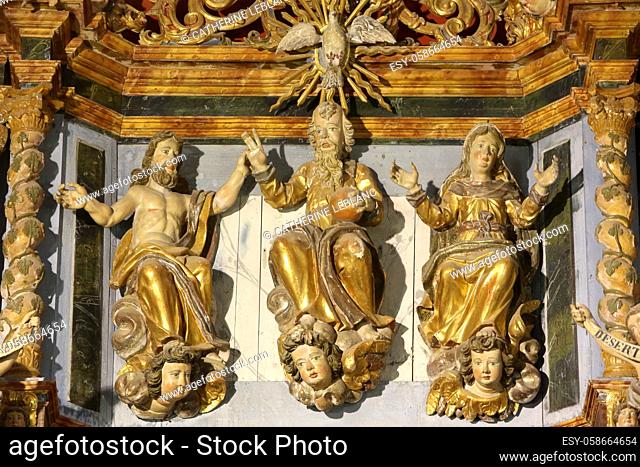 God, Jesus Christ and the Virgin Mary. The Holy Trinity. Sculptures. Altarpiece, (work of Jacques Clairant). Church of Notre-Dame de la Gorge