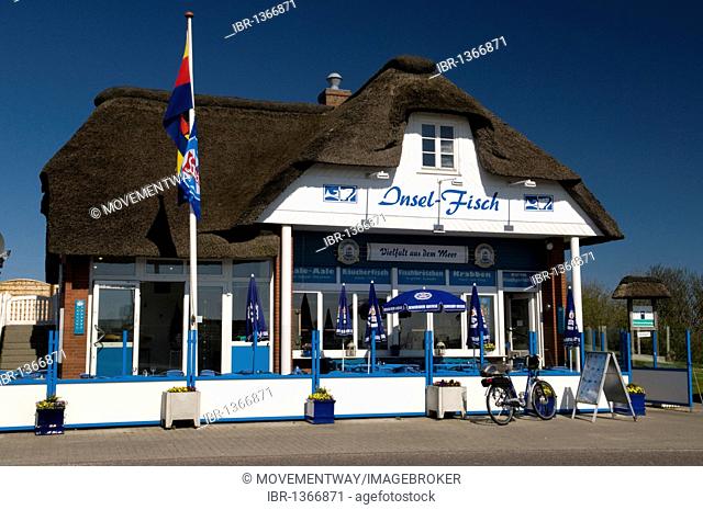 Thatched house, Insel-Fisch restaurant, Norderhafen harbor, Nordstrand island, Schleswig-Holstein, Germany, Europe