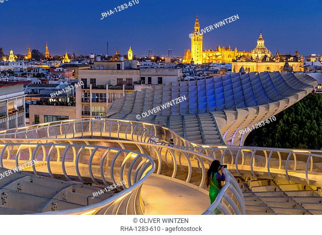 View from the top of Metropol Parasol over the city centre at dusk, Seville, Andalusia, Spain, Europe
