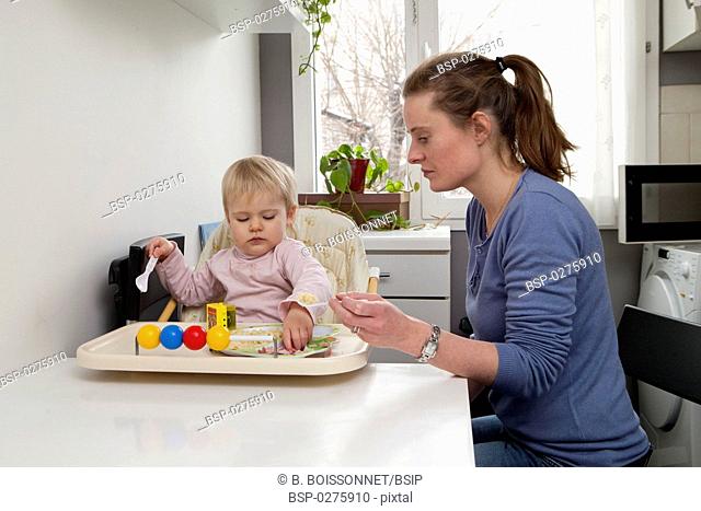 CHILD EATING A MEAL Models