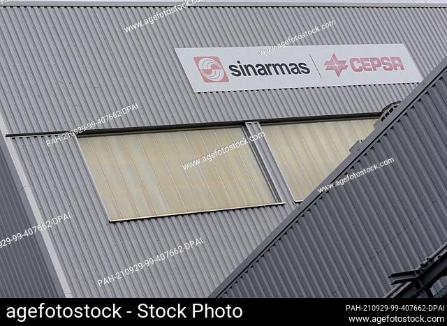 24 September 2021, Saxony-Anhalt, Genthin: ""Sinarmas"" and ""Cepsa"" are written on the façade of a production plant in the Genthin Chemical Park