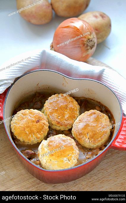 Lamb cobbler (lamb ragout with scone topping) in casserole