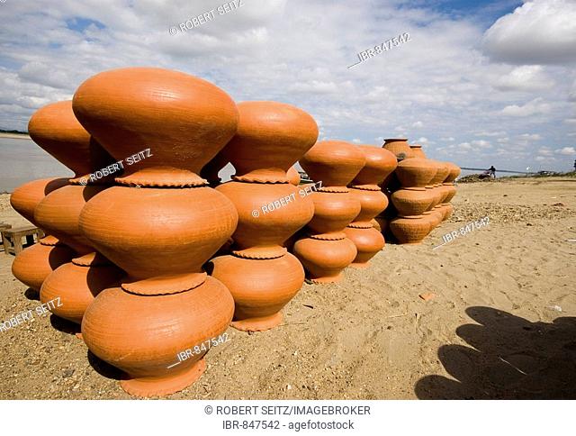 Jugs made of clay on the bank of the Irawaddy River, Bagan, Myanmar, Southeast Asia