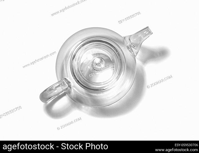 Glass teapot on white background