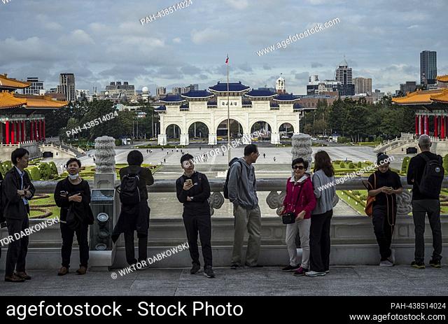 Visitors gather on the balcony overlooking Liberty Square with the iconic arch in the background in Taipei, Taiwan on 13/12/2023 by Wiktor Dabkowski