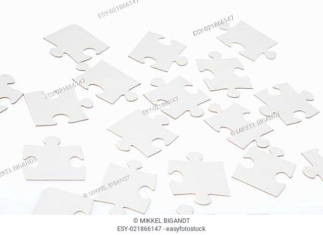 White Jigsaw Puzzle Pieces