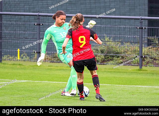 goalkeeper Serina Iddrisu Backmark (12) of Sweden trying to kick the ball away before Lisa Petry (9) of Belgium can get to it during a friendly soccer game...