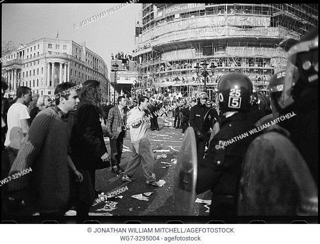 UK London - 1990 - Demonstrators are confronted by riot police in Trafalgar Square during the Poll Tax Riots London England UK - Picture by Atlas Photo...