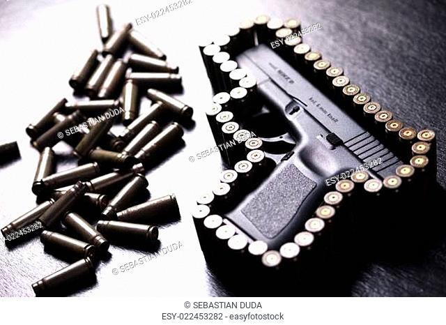 Ammunition and automatic handgun