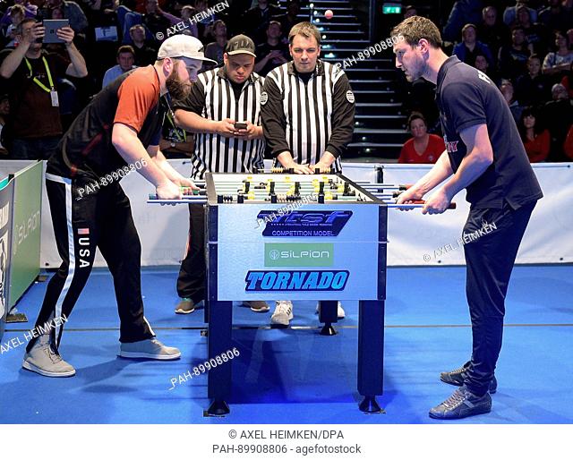 Ryan Moore (l) from Team USA and Miguel Dos Santos Lote from Team France playing against each other during the national final at the Table Soccer World Cup in...