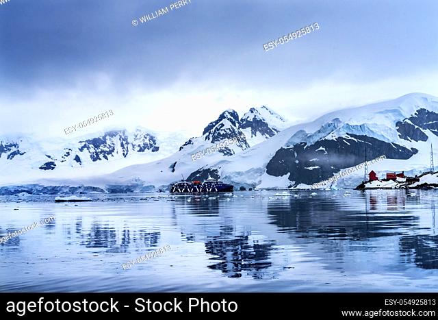 Snowing Cruise Ship Argentine Almirante Brown Station Blue Glacier Mountain Paradise Harbor Bay Antarctic Peninsula Antarctica