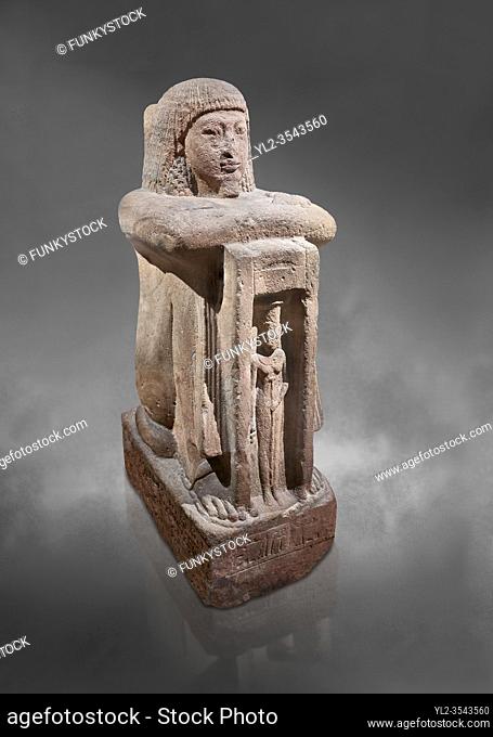 Ancient Egyptian statue of Qen, priest of Anukis, sanstone, New Kingdom, 19th Dynasty, (1292-1191 BC), Isalnd of sehel. Egyptian Museum, Turin