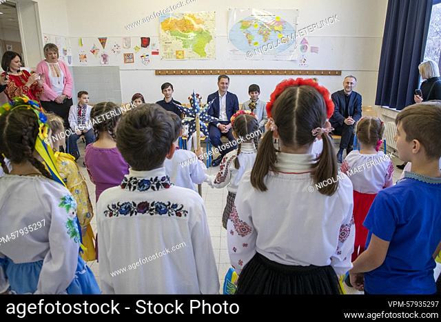 Tobias De Croo, Prime Minister Alexander De Croo, (C) and Gabriel De Croo pictured during a visit of Belgian Prime Minister De Croo to a Ukrainian school on the...