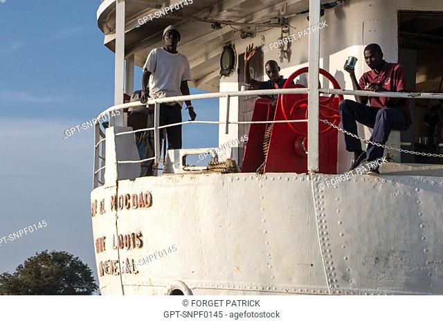 MEN FROM THE CREW OF THE BOU EL MOGDAD CRUISE BOAT FROM THE SENEGAL RIVER COMPANY, SENEGAL, WEST AFRICA