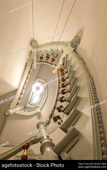 09 April 2021, Saxony-Anhalt, Magdeburg: This staircase with plenty of stucco on the walls is located at Hegelstraße 16. In Magdeburg there are still a number...