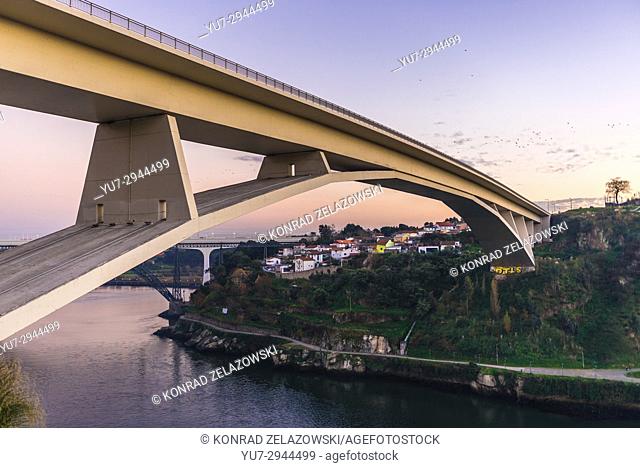 Infante D. Henrique Bridge over Douro River between Porto and Vila Nova de Gaia cities, Portugal. Old and new railway bridges seen on background