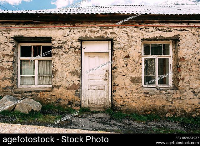 Stepantsminda Gergeti, Georgia. Door Of Old Hillside House In Village. Kazbegi District, Mtskheta-Mtianeti Region, Georgia. Spring Or Summer Season