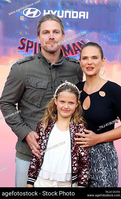Stephen Amell, Cassandra Jean and daughter Mavi at the premiere of 'Spider-Man: Across the Spider-Verse' held at the Regency Village Theater in Westwood