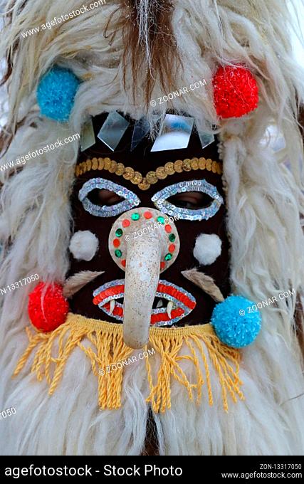Pernik, Bulgaria - January 27, 2019 - Masquerade festival Surva in Pernik, Bulgaria. People with mask called Kukeri dance and perform to scare the evil spirits