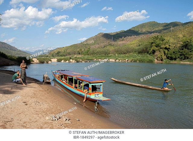 Tourist boat at rest on the river Nam Ou, at Nong Khiao, Khiaw Nong, Luang Prabang province, Laos, Southeast Asia, Asia