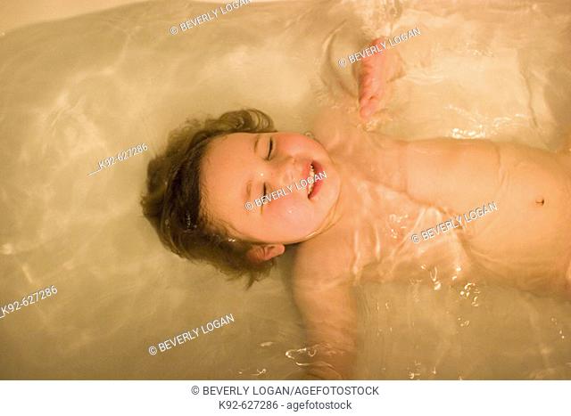 Three year old boy in the bathtub