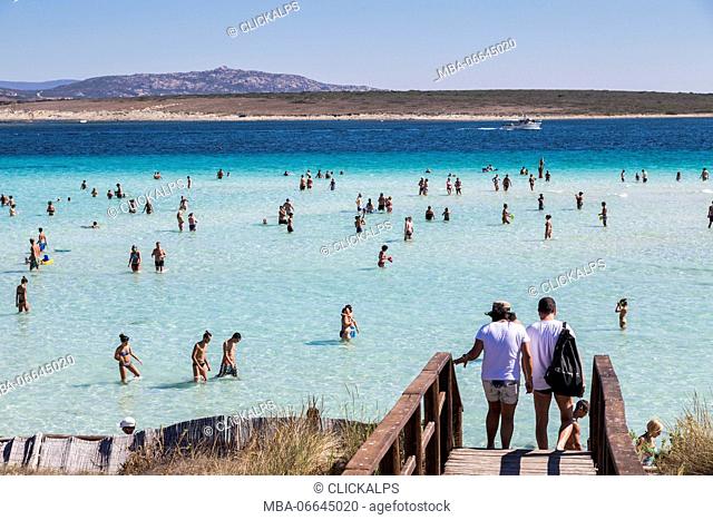 Bathers in the turquoise sea La Pelosa Beach Stintino Asinara National Park Province of Sassari Sardinia Italy Europe