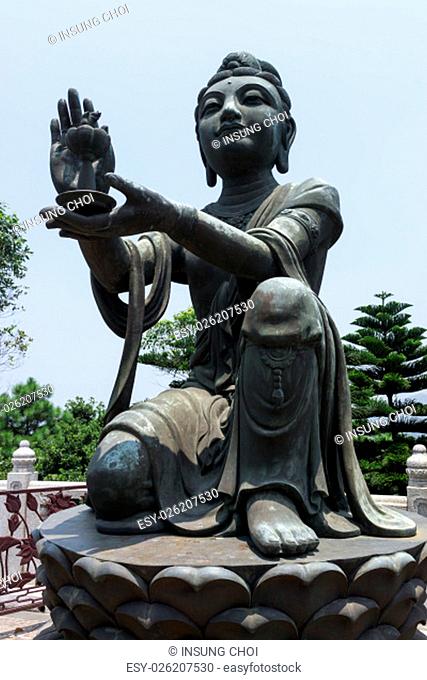 the statues of buddhist religious statues in tian tan buddha on top of ngong ping plateau in lantau island in china