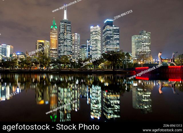 Melbourne, Australia - April 24, 2015: Skyline view over the Yarra River with reflections in the water