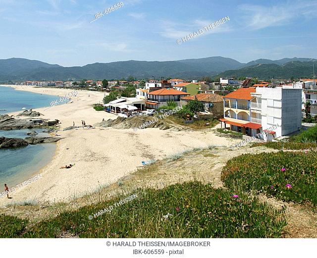 Beach on Greek peninsula Halkidiki Chalkidiki Sithonia in the town of Sarti