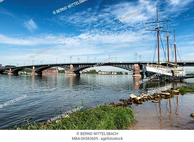 Mainz, Rhineland-Palatinate, Germany, Rhine promenade with Theodor Heuss bridge, parliament building and the Event location sailing ship 'Pieter van Amstel'