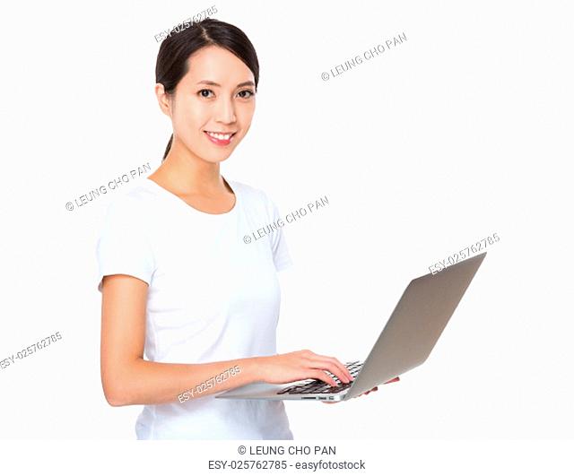 Asian woman use of the laptop computer