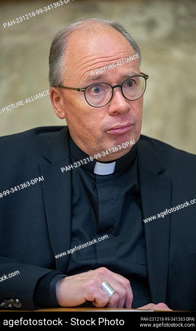 PRODUCTION - 14 December 2023, Rhineland-Palatinate, Trier: The Bishop of Trier, Stephan Ackermann, talks about the upheaval in the Catholic Church in an...