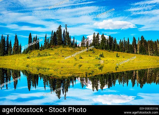 Serenity lake in the mountains in summer season. Beautiful natural landscapes