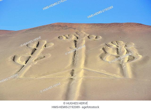 Peru, Pisco Province, Ballestas islands, boat trip across the Paracas National Reserve, the Paracas Candelabra (El Candelabro) is a geoglyph engraved on flank...