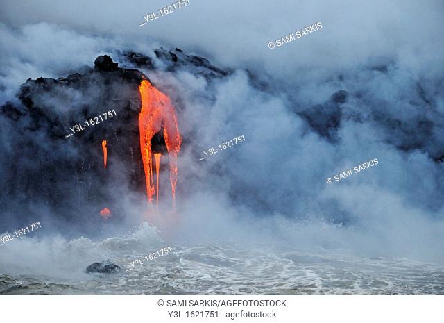 Steam rising off lava flowing into ocean, Kilauea Volcano, Big Island, Hawaii Islands, USA
