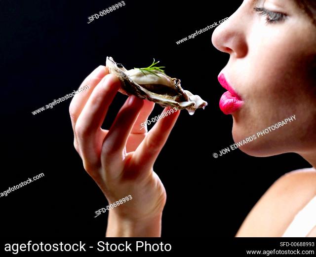 Woman About to Eat an Oyster