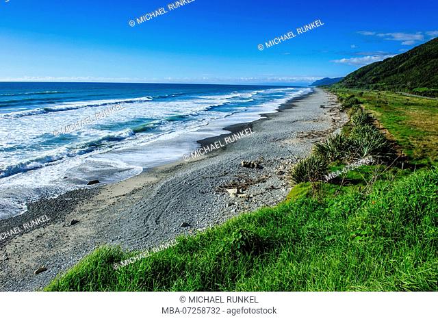 Coastline and a rocky beach near Karamea, South Island, New Zealand