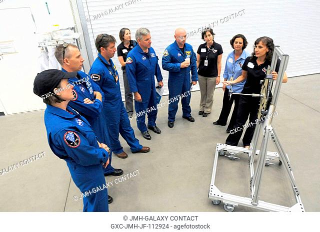 STS-134 crew members get a briefing on the Sensor Test for Orion Relative Navigation Risk Mitigation Development Test Objective by the lead project engineers at...