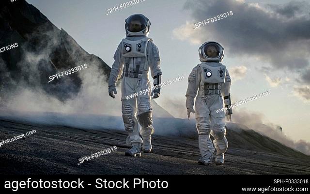 Two astronauts walking on an alien planet