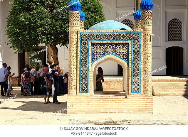 Bukhara, Uzbekistan - August 28, 2016: Tourists at Memorial complex of Khoja Bakhouddin Naqshbandi, a most important pilgrimage place for Islam