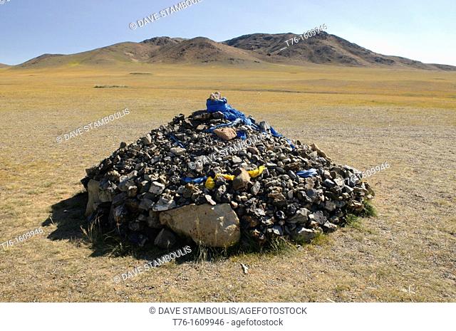 big landscape and sacred ovoo prayer stones in the Orkhon River Valley of Central Mongolia