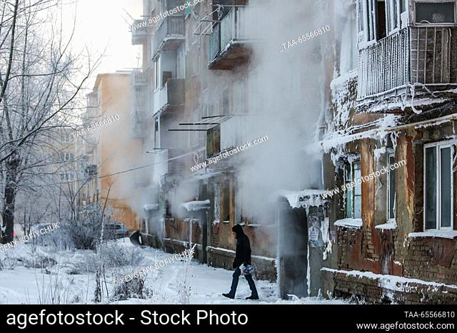 RUSSIA, OMSK - DECEMBER 8, 2023: A view of an ice-coated building in the Siberian city of Omsk on a frosty winter day. According to Russia's weather forecasting...
