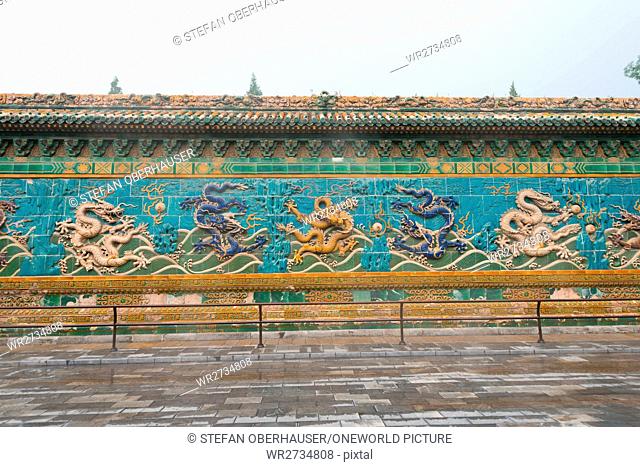 China, Beijing, Nine-Dragon Wall (5m high and 27m long wall of colored glazed tiles) at Beihai Park