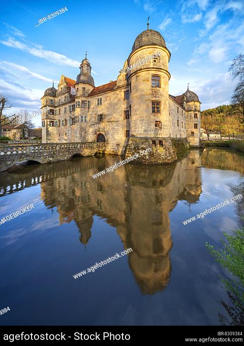 Mitwitz moated castle in the evening light, water reflection, Kronach district, Upper Franconia, Bavaria, Germany, Europe