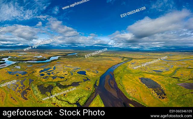 Aerial panorama view of Avacha river delta and hilly landscape, Kamchatka Peninsula, Russia