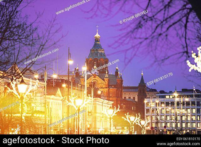 Helsinki, Finland. Very Peri Starry Sky Above Uspenski Cathedral On Hill In Evening Or Night Illuminations Lights. Tourist Destination