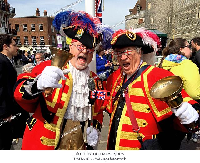 Steve Clow (67, L) and Peter Baker (67, R) from Chelmswood arrived dressed as town criers to celebrate the British Queen in Windsor, Great Britain